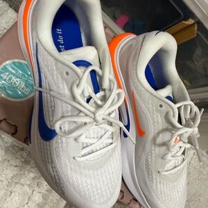 White and Blue Nike Shoes